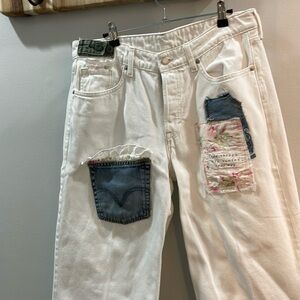 Upcycled jeans with vintage fabric.